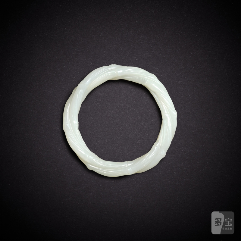 A white jade 'twist-rope' bangle, Qing dynasty, 19th century | 清十九世紀 白玉絞絲紋鐲